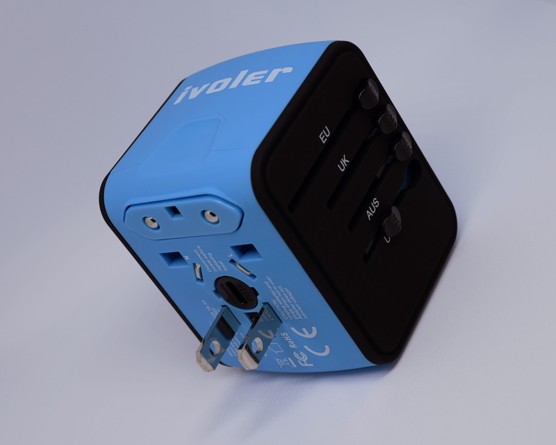 no people, indoors, technology, mobile phone, portable information device, inline, control, communication, wireless technology, travel adapter, high angle view