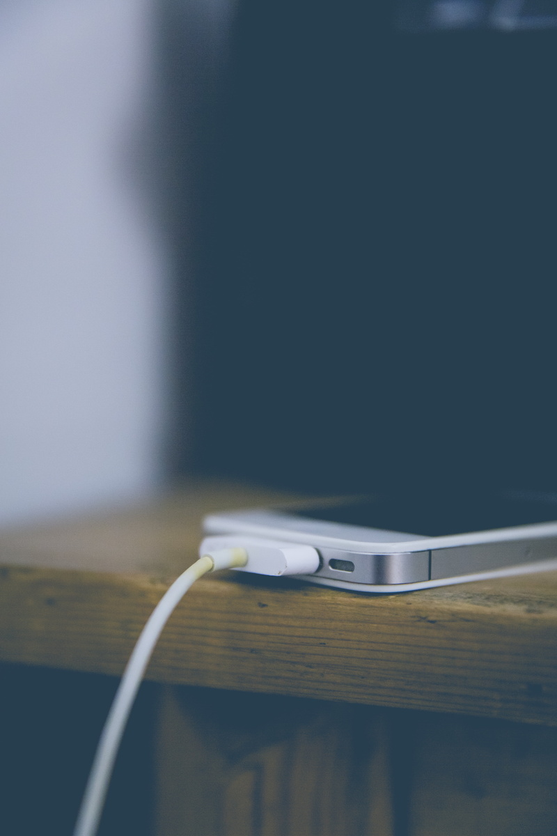 power supply, smartphone, computer network, table, usb cable, connect, electricity, close-up, abstract, no people, dark, technology, computer cable, still life