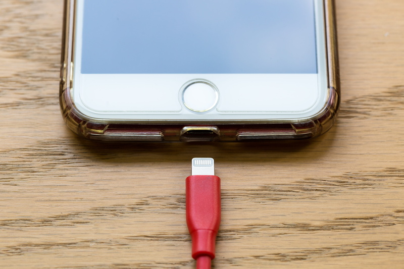 portable information device, metal, connection, cellular, recharge, close-up, battery, blank, no people, iphone, phone, cell, communication, indoors, red
