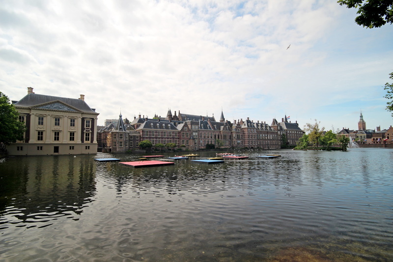house, building exterior, tree, transportation, historical, the hague, mode of transportation, landmark, cloud - sky, waterfront, outdoors, holland, no people