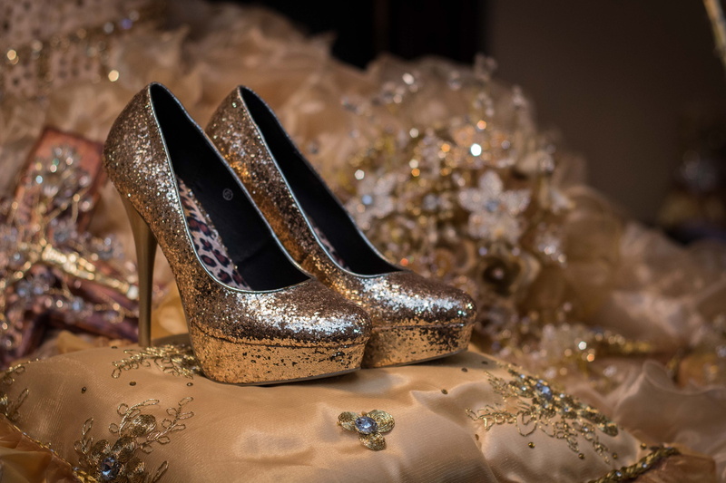 still life, gold, shiny, fashion, foot, close-up, pearl jewelry, no people, footwear, pair, celebration, precious gem, bracelet, bed, silver colored, indoors