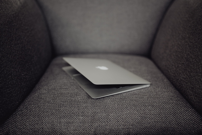 computer, close-up, mobile phone, leather, laptop, technology, communication, indoors, motor vehicle, armchair, grey, no people, portable information device