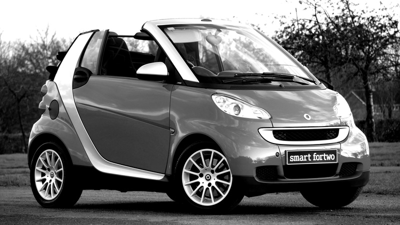 coupe, day, transportation, land vehicle, drive, city, focus on foreground, motor vehicle, modern, engine, road, mode of transportation, street, vehicle