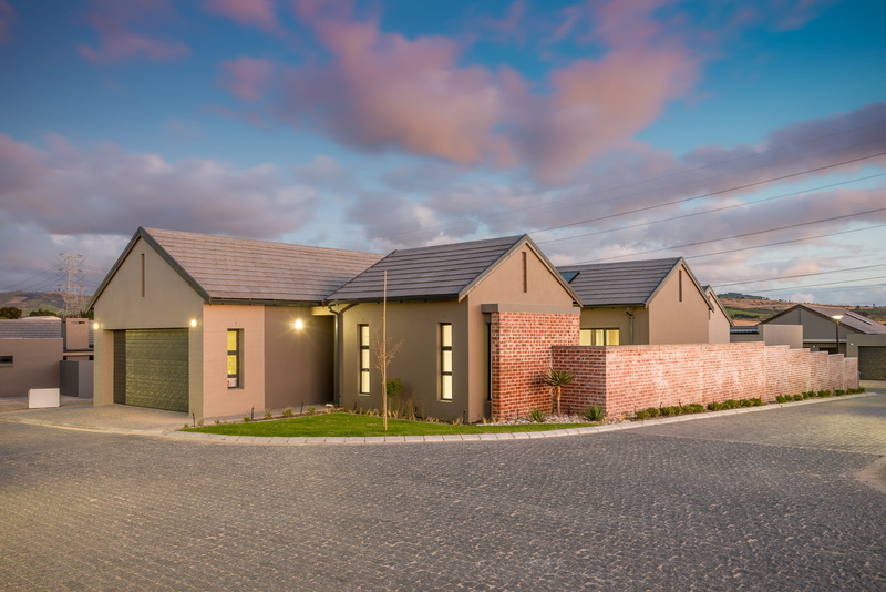 no people, sky, home ownership, outdoors, house, day, residential district, driveway, building, detached house, building exterior, built structure, street