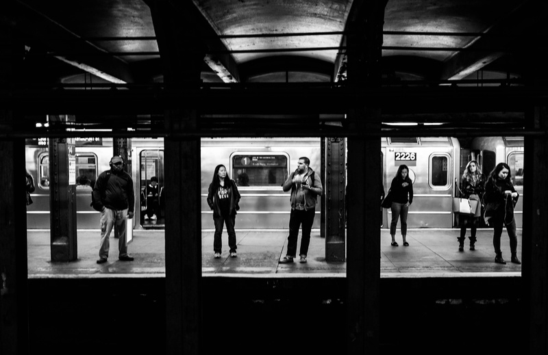 railroad station platform, symmetry, ceiling, public transportation, space, city, passenger, flooring, lifestyles, architecture, indoor, light, train, men