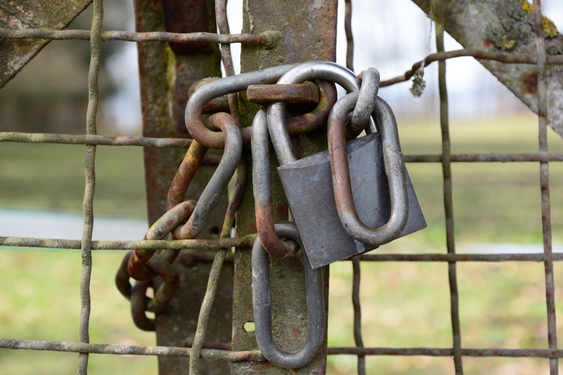 locked, to, hanging, outdoors, iron - metal, castle, close, secure, locks to, chain, focus on foreground, lock, barrier, connection, lockable, closed, padlock