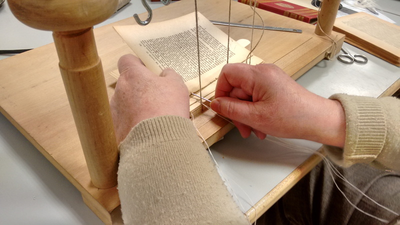 one person, workshop, accuracy, human hand, 2K, creativity, art and craft, books, occupation, human body part, preparation, real people, adult, design professional