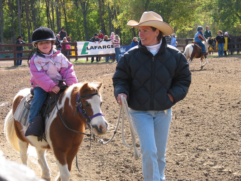 horse riding, females, livestock, pony, looking at camera, men, domestic animals, outdoors, riding, domestic, real people, vertebrate, woman, pony riding