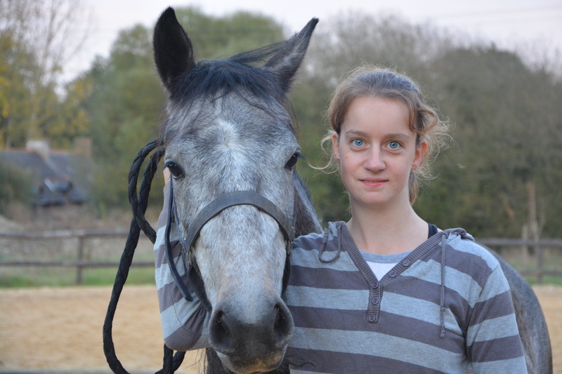 hair, hairstyle, front view, portrait, animal, affection, offspring, outdoors, one person, livestock, horseback riding, look, looking at camera, pets, domestic animals
