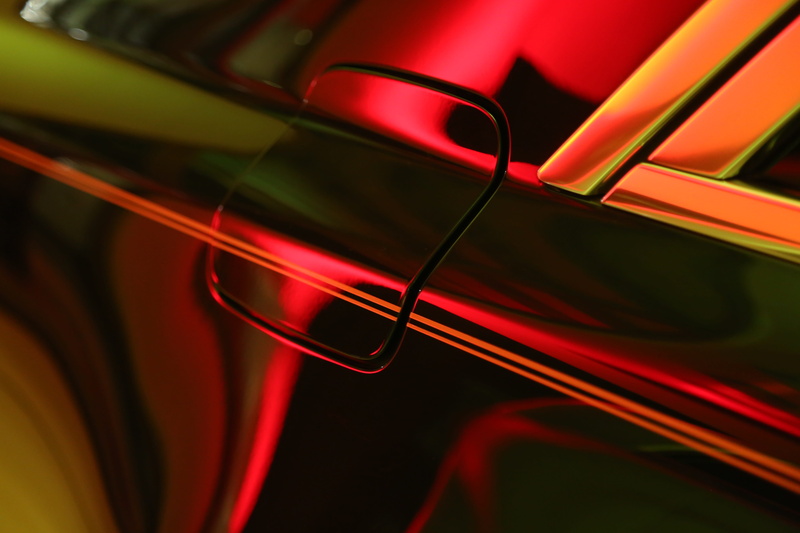 gas tank door, glowing, fuel and power generation, wealth, full frame, screw, closed, luxury, abstract, reflection, red, macro, speed, shiny, connection