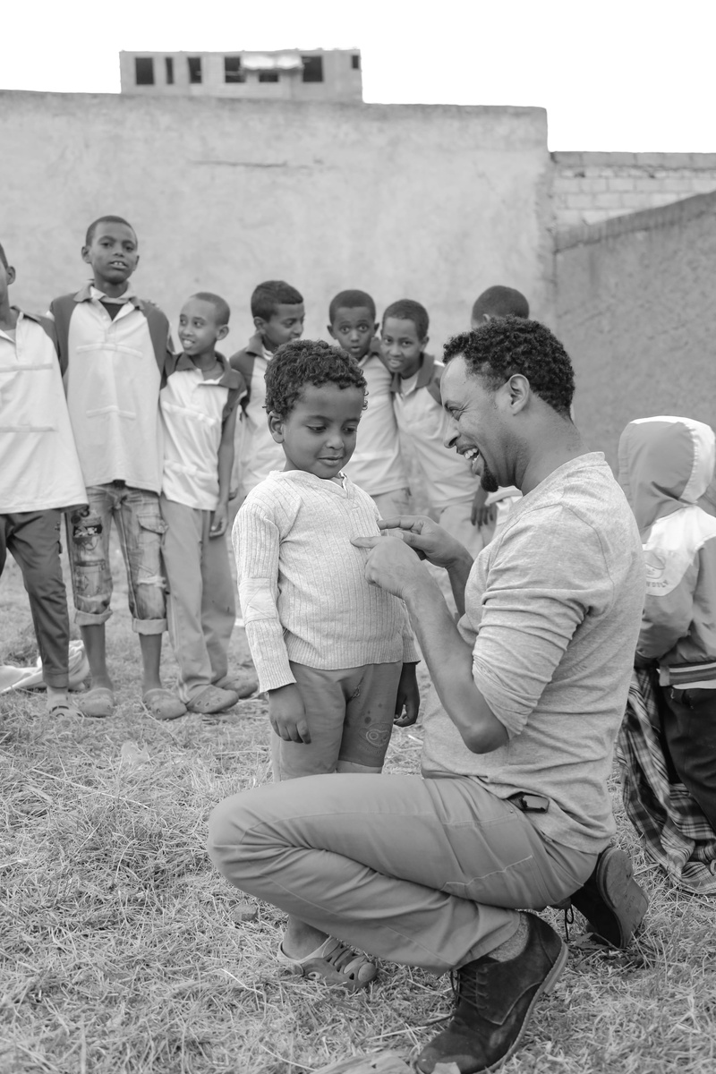 outdoors, addis abeba, shoe, togetherness, 5K, kid, sister, women, photography, lifestyles, casual clothing, tickling, men, apparel, childhood, group of people
