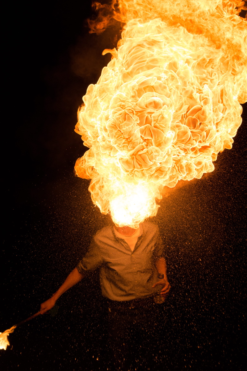hands, dark, warning sign, bottle, torch, burning, male, skill, black background, fire eater, nature, 5K, obscured face, real people, orange color, spark