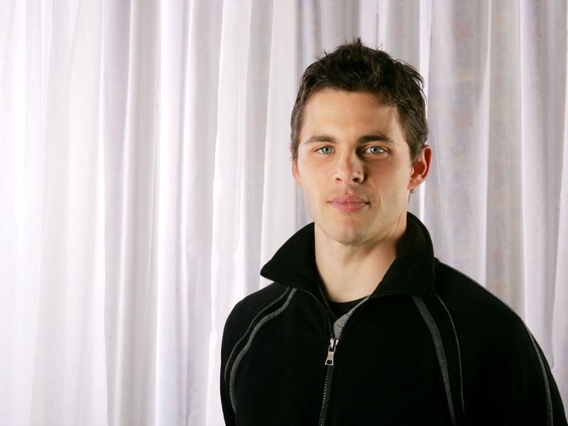 Charming, brown hair, front view, casual clothing, standing, adult, men, males, black color, headshot, mid adult, 720P, young adult, curtain, Dark-haired