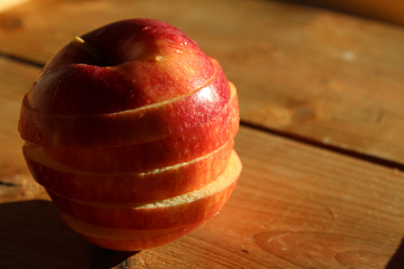 high angle view, red, wood, cricket insect, table, wood grain, insect, still life, apple, fruit, invertebrate, single object, caramel, dip, wood - material