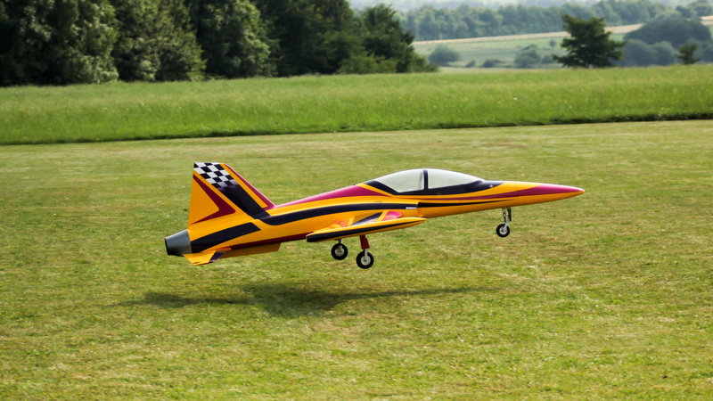 model airplane, Jet, nature, land, transportation, growth, Flight, outdoors, jet, park, single object, Turbine, tree, turbine, green color, absence, model flight