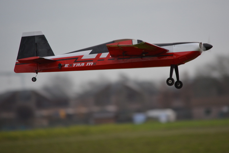 outdoors, flying, 5K, motion, Fly, air, side view, sky, military, transportation, mid-air, Plane, helicopter, air vehicle, focus on foreground, red, no people