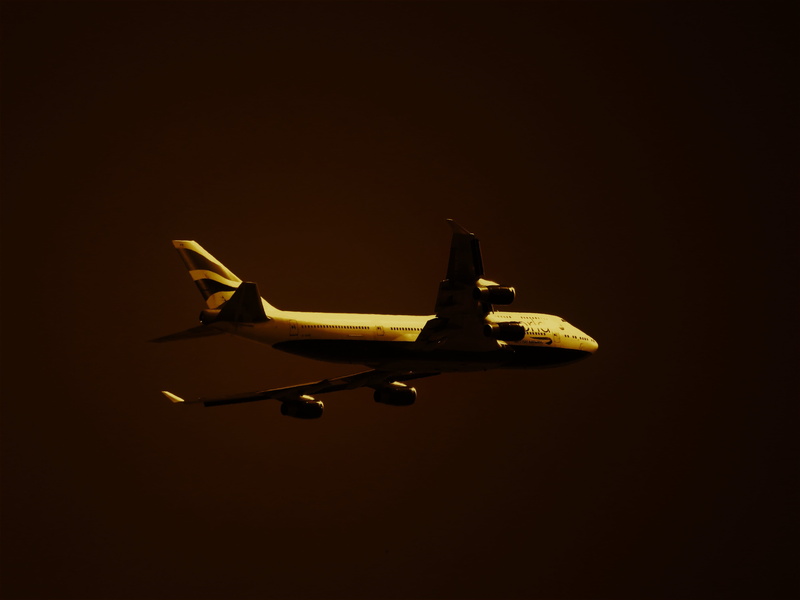 air, mid, aircraft, yellow, 5K, aeroplane, single object, travel, indoors, army, aviate, flight, airplane, black background, still life, jet, flying, aviation