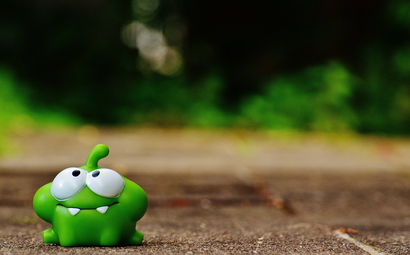 outdoors, savings, figure, finance, animal, app, cut the rope, plant, animal themes, grass, focus on foreground, tree, day, representation, cute, animal representation