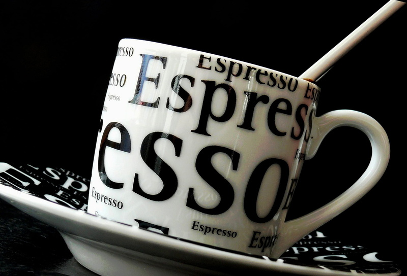 single word, no people, coffee, coffee - Drink, western script, refreshment, kitchen utensil, saucer, cup, crockery, still life, white, communication, black Color