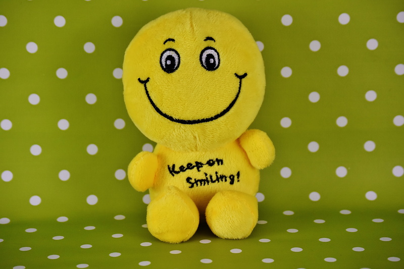 animal themes, creativity, 5K, smile, anthropomorphic smiley face, polka dot, close-up, toy, indoors, text, Points, Smiley, yellow, no people, Background