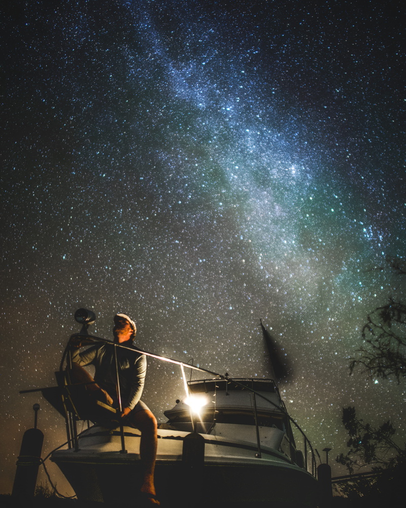 universe, nebula, lifestyles, man, star, low angle view, beauty in nature, light, galaxy, star - space, person, skt, portrait, terrace, flare, outer space