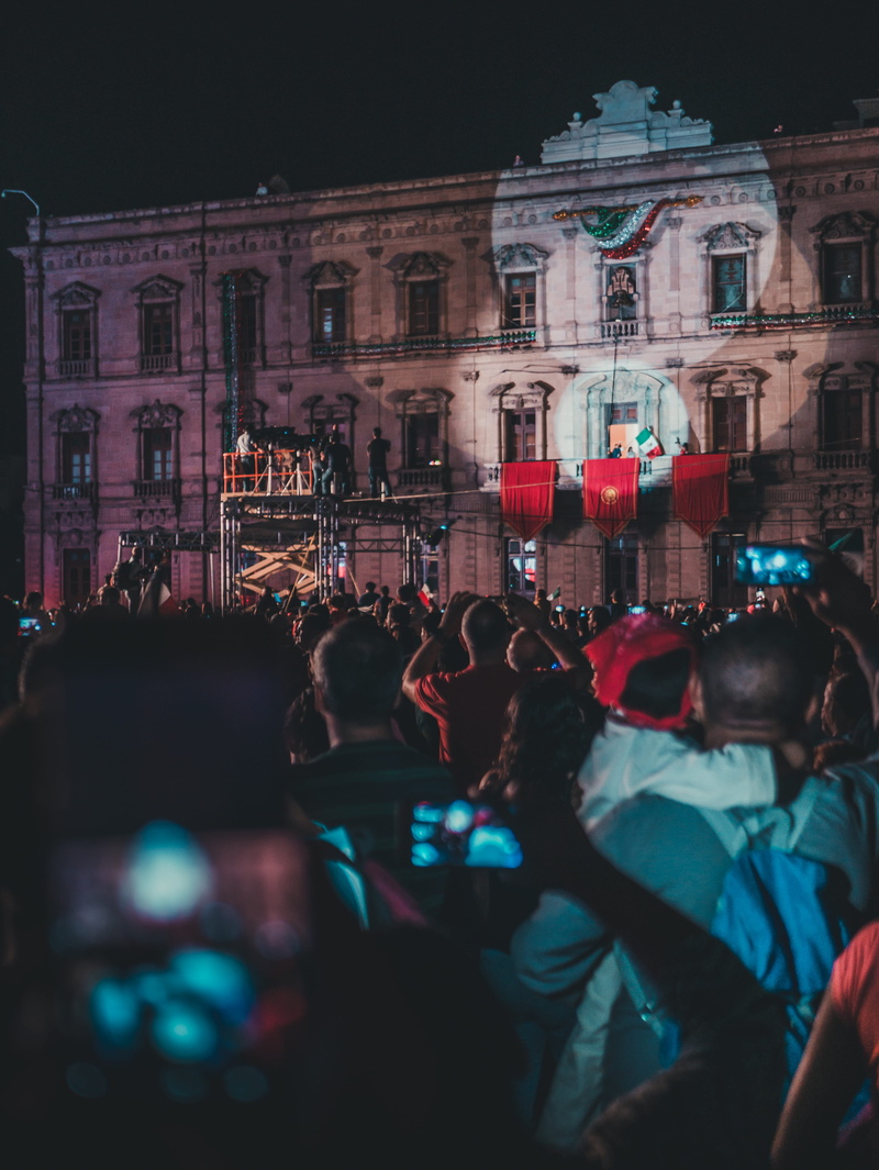 outdoors, mexican, tourism, light, tourist, city, busy, evening, mexican flag, architecture, urban Scene, europe, street, illuminated, group, spectator