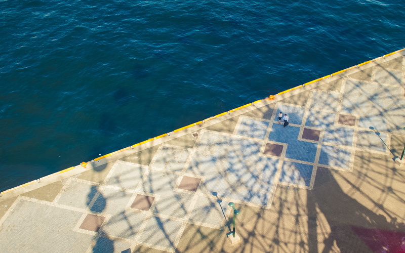 architecture, blue, boardwalk, swimming Pool, by the sea, lifestyles, body, walking, standing, water, poolside, one person, person, real people, leisure activity