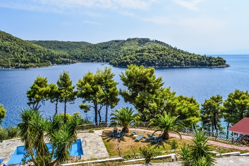 built structure, aegean, water, tranquil scene, pine forest, island, beauty in nature, growth, tree, tropical climate, skopelos, palm tree, plant, beach