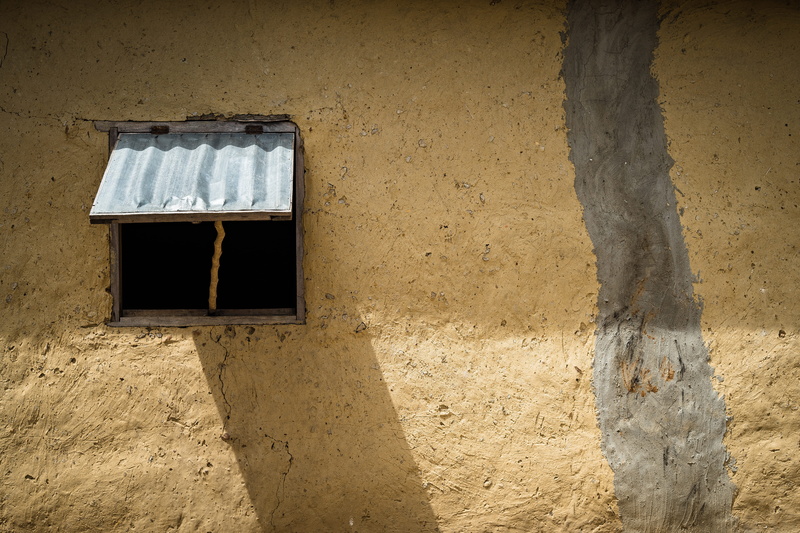 damaged, shadow, weathered, outdoors, building exterior, lines, home, old, building, low angle view, open, sunlight, benin, perma, geometry, day, bad condition
