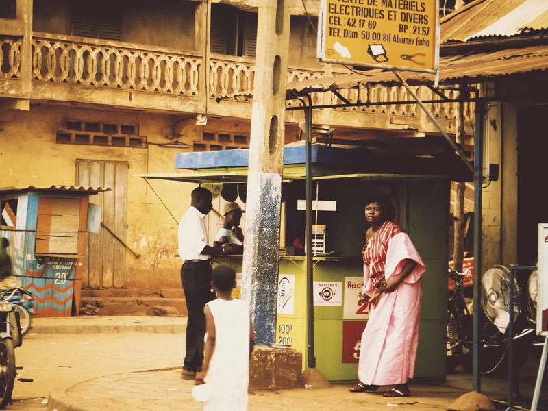 architecture, child, built structure, lifestyles, people, street, adult, outdoors, casual clothing, text, two people, women, benin, men, building, woman