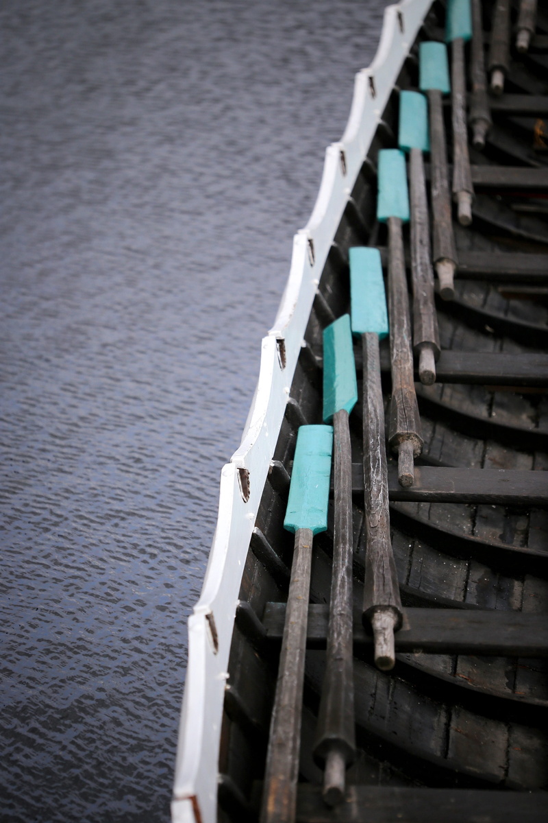 boat, building, selective focus, high angle view, lake, large group of objects, 2K, wooden, brown, water, outdoors, city, transportation, dock, nature