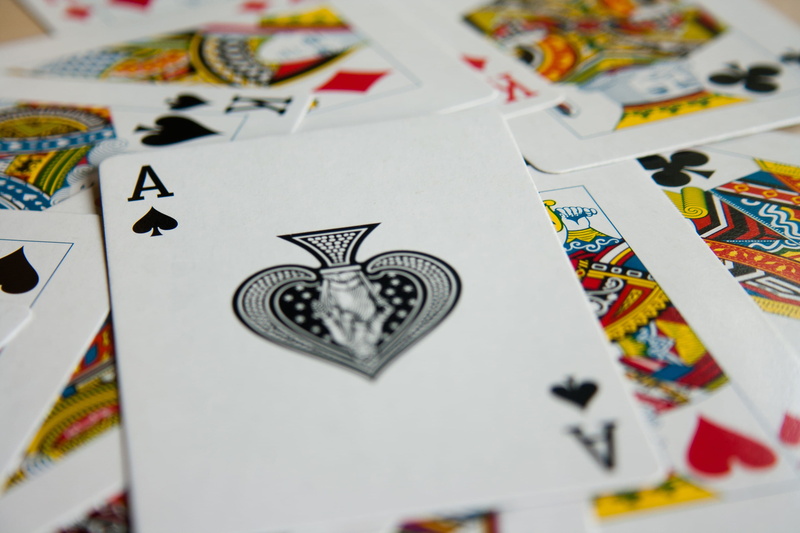 ace, high angle view, spades, poker - card game, indoors, luck, gambling, no people, table, close-up, relaxation, playing cards, deck, arts culture and entertainment