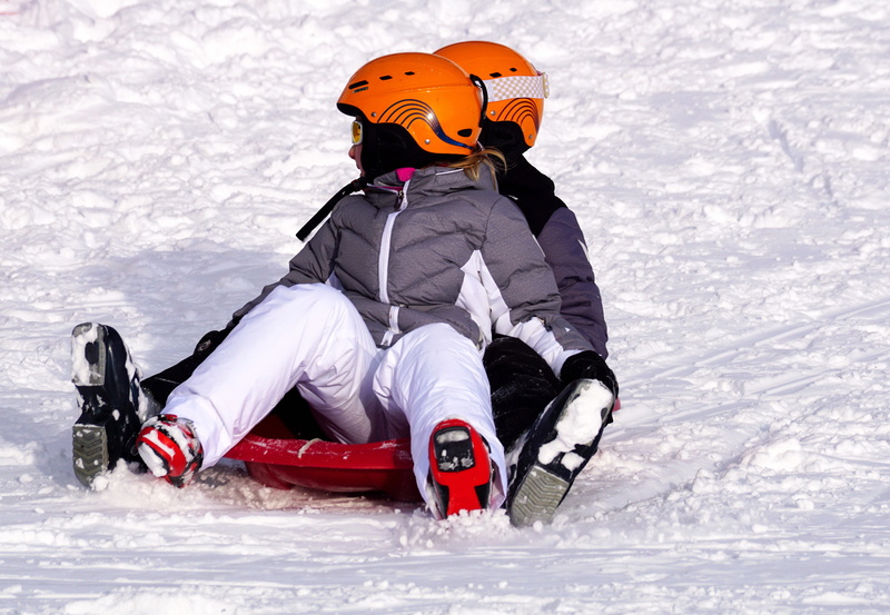 cold, leisure activity, helm, helmet, fun, action, children, lifestyles, outdoors, one person, real people, move, snow, ski-wear, ice, toboggan, range of motion