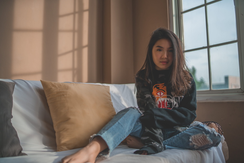 couch, young women, long hair, human, real people, table lamp, hair, window, lamp, computer, daytime, near, home interior, electronics, home decor, person