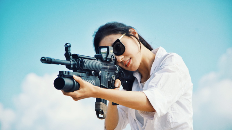 females, waist up, blue, hairstyle, government, standing, one person, aiming, uniform, tactial, adult, women, aggression, military, young adult, sky, female