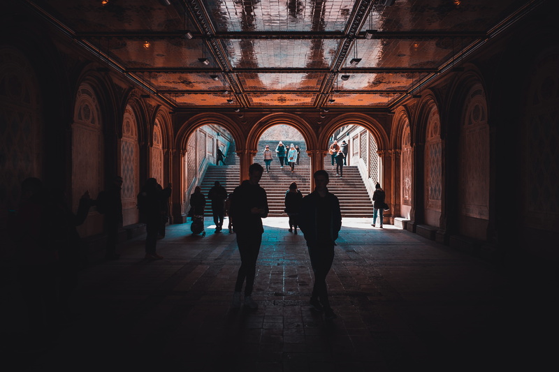 ceiling, floor, people, architecture, architectural column, united states, indoors, rear view, dungeon, travel, human, direction, silhouete, women, corridor