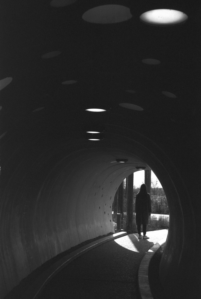 pants, motor, sewer, rear view, silhouette, engine, human, bunker, men, crypt, full length, hole, unrecognizable person, indoors, machine, turbine, lifestyles