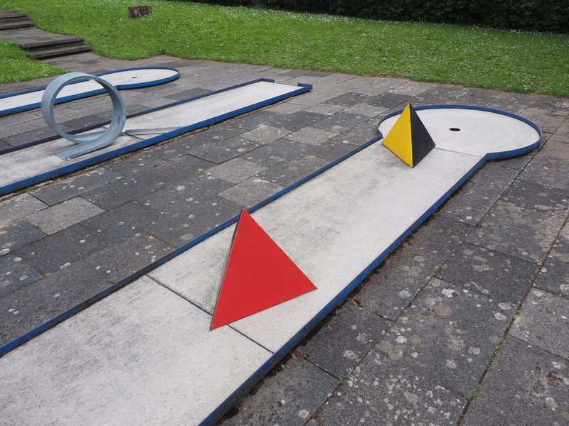outdoors, golf, pyramids, paving stone, grass, day, nature, absence, no people, shape, Minigolf, pyramid web, railing, city, precision sport, Plant, symbol