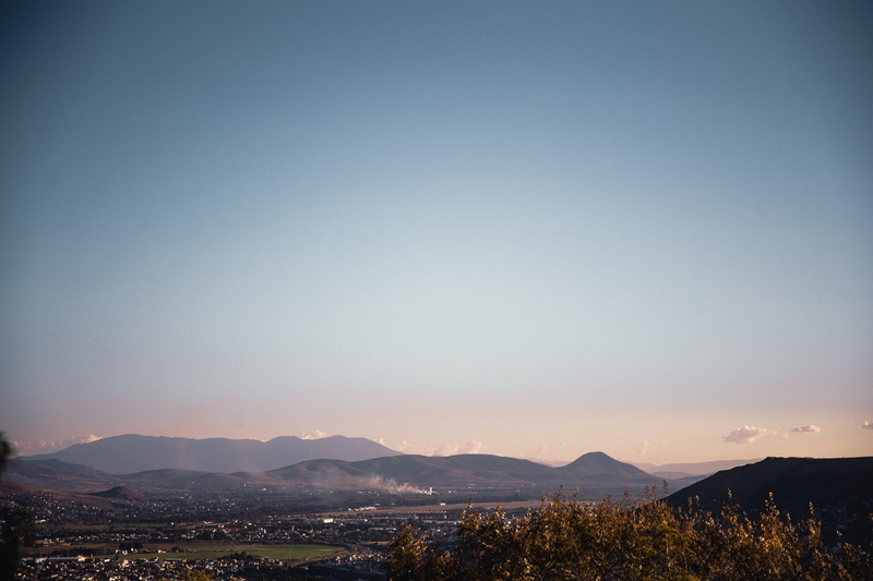 scenics - nature, tranquil scene, 2K, sky, outdoors, pastel, landscape, sunset, no people, blue, environment, village, mountain, green, architecture, copy space