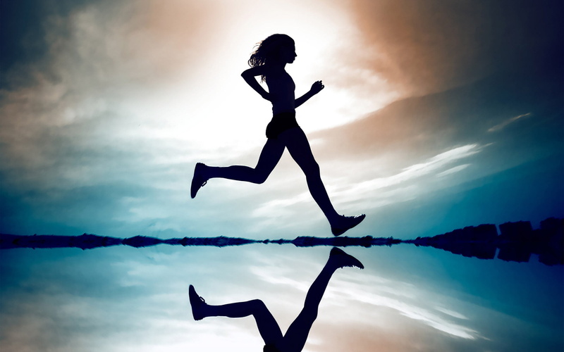 motion, cloud - sky, the sky, sunset, one Young Woman Only, girl, black Color, water, action, jumping, back Lit, success, vitality, arms raised, healthy Lifestyle