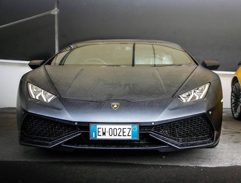 racing car, communication, technology, black, government, racing, photo, speed, day, automobile, lamborghini, aerospace industry, motor vehicle, text, headwear