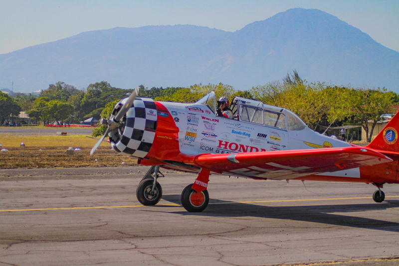 vehicle, day, travel, outdoors, motion, jet aircraft, on the move, sunlight, fast, wheel, fly, air vehicle, side view, land vehicle, mountain range, engine