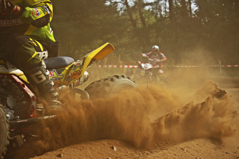dirt, enduro, sports helmet, machinery, competition, quad, mode of transportation, headwear, extreme Sports, motorcycle sport, competitive sport, sand