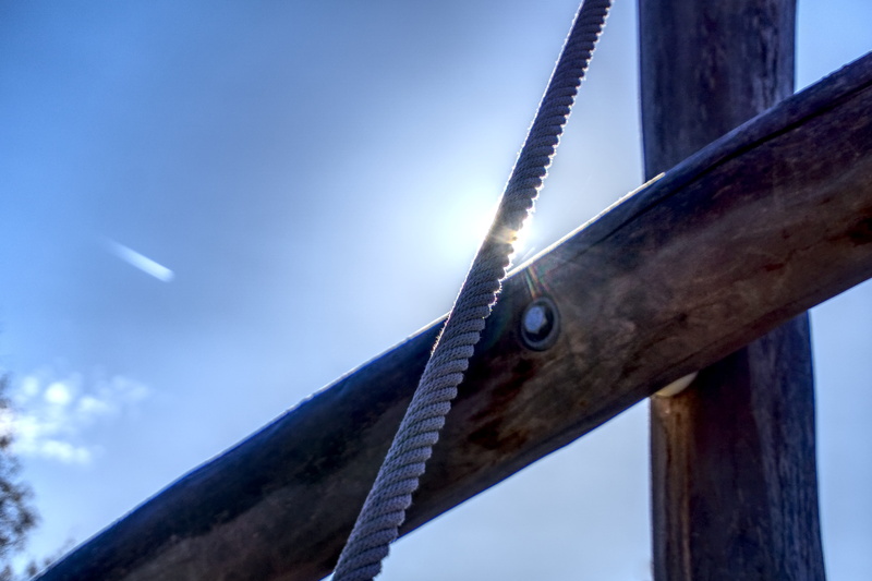 bridge - man made structure, wood, climb, nature, rope, wood trunks, shining, fun, transportation, strength, backlighting, contrast, high, playground, blue