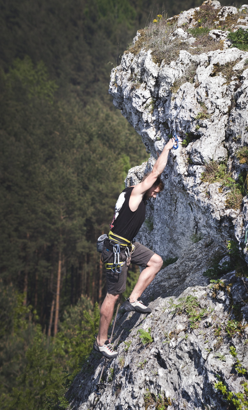 wearing, leisure activity, effort, skill, rock, rock climbing, action, summer, lifestyles, formation, courage, outdoors, hike, extreme sports, solid, challenge
