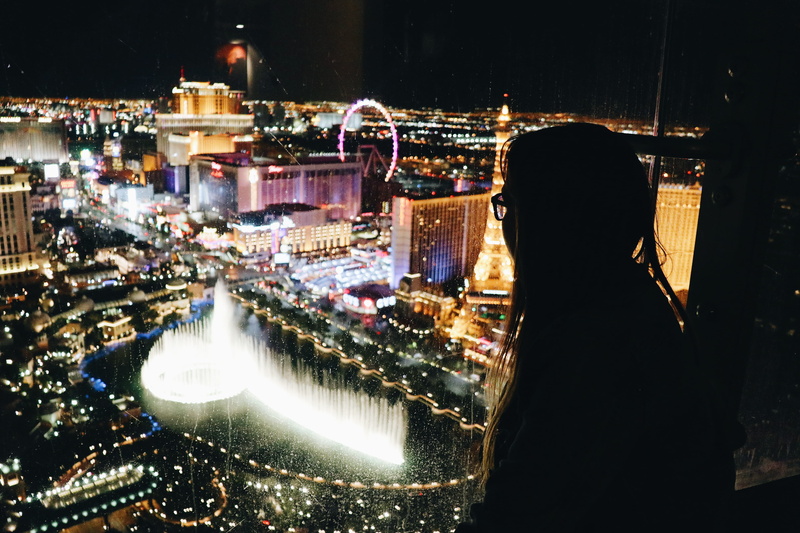 front, city, metropolis, person, people, paris, near, lighting equipment, worship, city life, men, las, water, town, lifestyles, one person, outdoors, vegas
