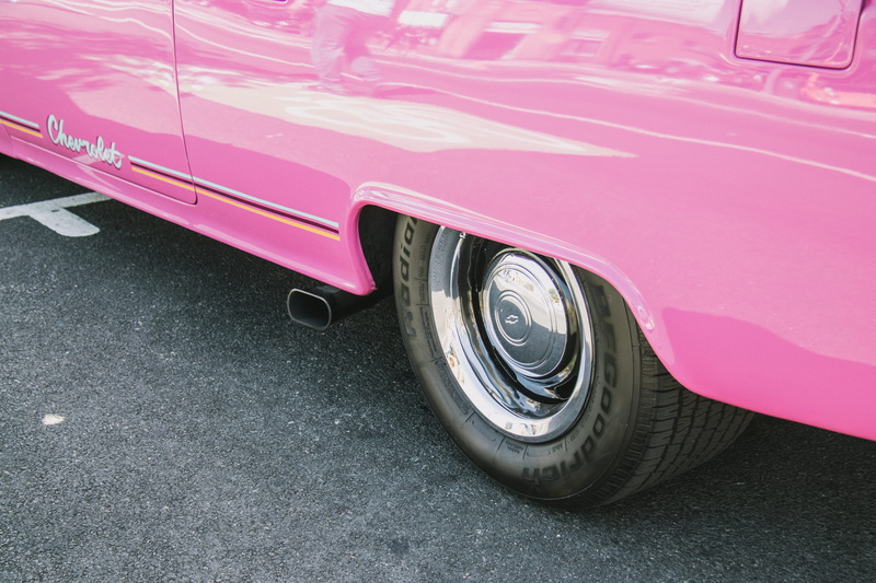 motor vehicle, tire, transportation, metal, consumerism, chevy, 5K, chrome, city, road, luxury, land vehicle, vintage car, exhaust, street, pink color