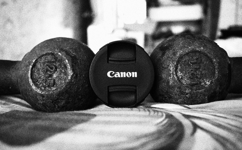 exercising, still life, weight training, healthy lifestyle, western script, focus on foreground, canon, exercise equipment, gym, text, 5K, sport, sports training