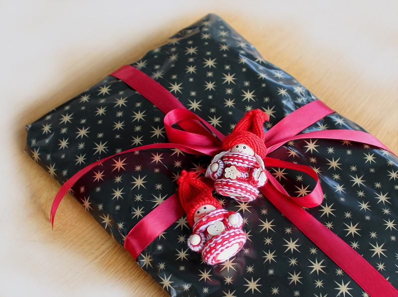 no people, under the tree, uSA, tied bow, package, ribbon - sewing item, close-up, gift, floral pattern, wrapping paper, surprise, goft, indoors, christmas gift