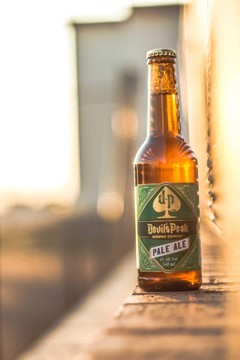 transparent, food and drink, no people, beer, bokeh, container, selective focus, text, ale, still life, table, sunlight, glass - material, focus on foreground